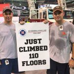 Two firefighters after climbing 110 floors